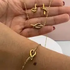 Coordinado 3 piezas - Estilo Nudo  - Aretes, Collar y Pulsera