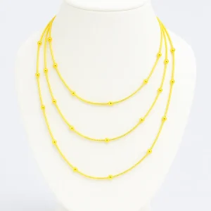 Collar Triple Conectado Dorado